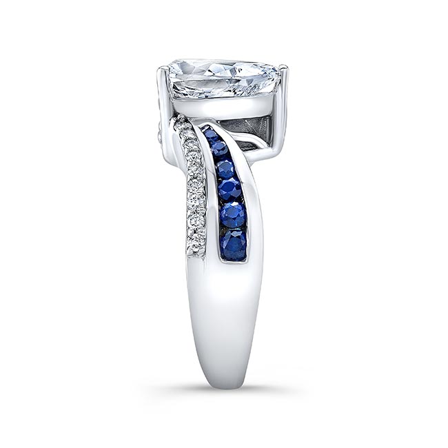 Blue Sapphire Accent Pear Shaped Moissanite Ring Image 3